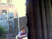 My Grandmother in Backyard Playin Cards